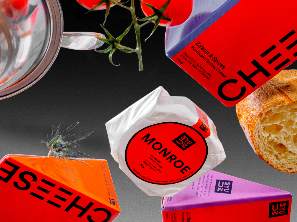 UMYUM plantbased cheese products arranged with bread and food styling elements.