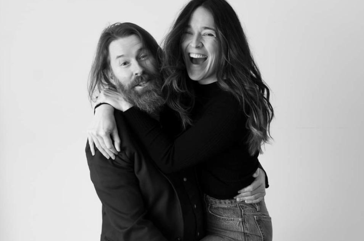 Baz and Katherine, founders of UMYUM, photographed together in a studio portrait.